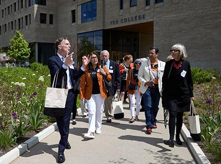 Maitland Jones leads guests on a tour of Yeh College